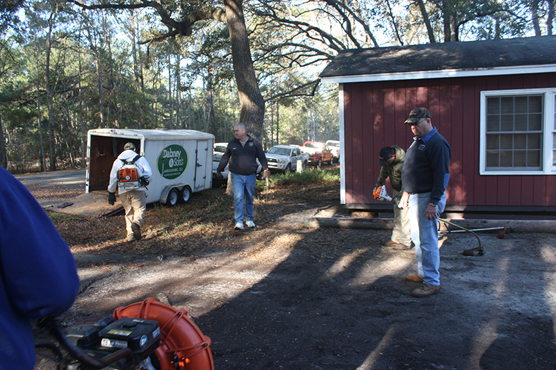 A group of CFD members, led by Battalion Chief John Winn, traveled out to Adams Run to spend the morning with Captain Richard Ridge, CFD Retired, and his wife Maggie. Captain Ridge has been quite ill and it was great to visit with them. We spent the morning helping them clean their yard to get them ready for the holidays. Around midday, we were treated to our own tailgate party as Assistant Chief Robbie O'Donald and his sons served up a great barbeque lunch to us all.
