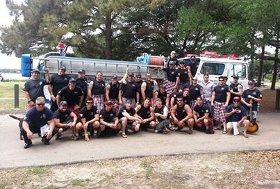 Firefighters competed in the Dragon Boat Races which raises money for cancer survivor programs in Charleston - 2014. 'Big John" was there to support the cause!